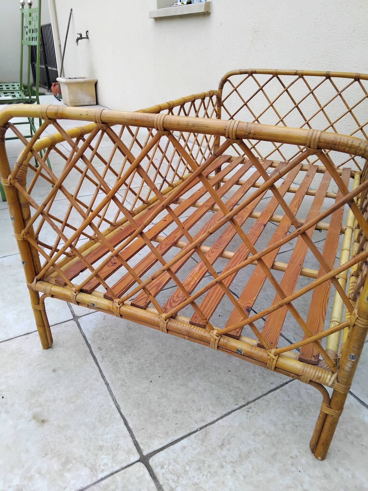 Vintage rattan child or baby bed