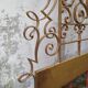 Golden wrought iron bedhead