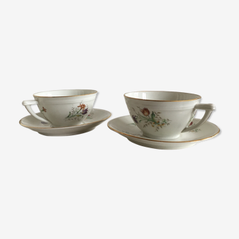 Duo of white Limoges porcelain cups with flowers
