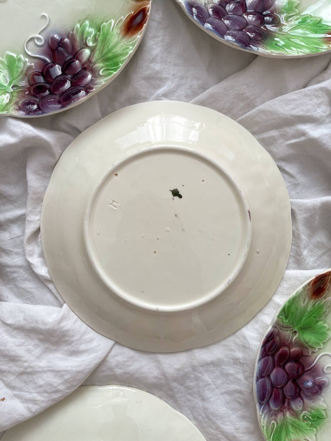 8 antique earthenware dessert plates with grapes