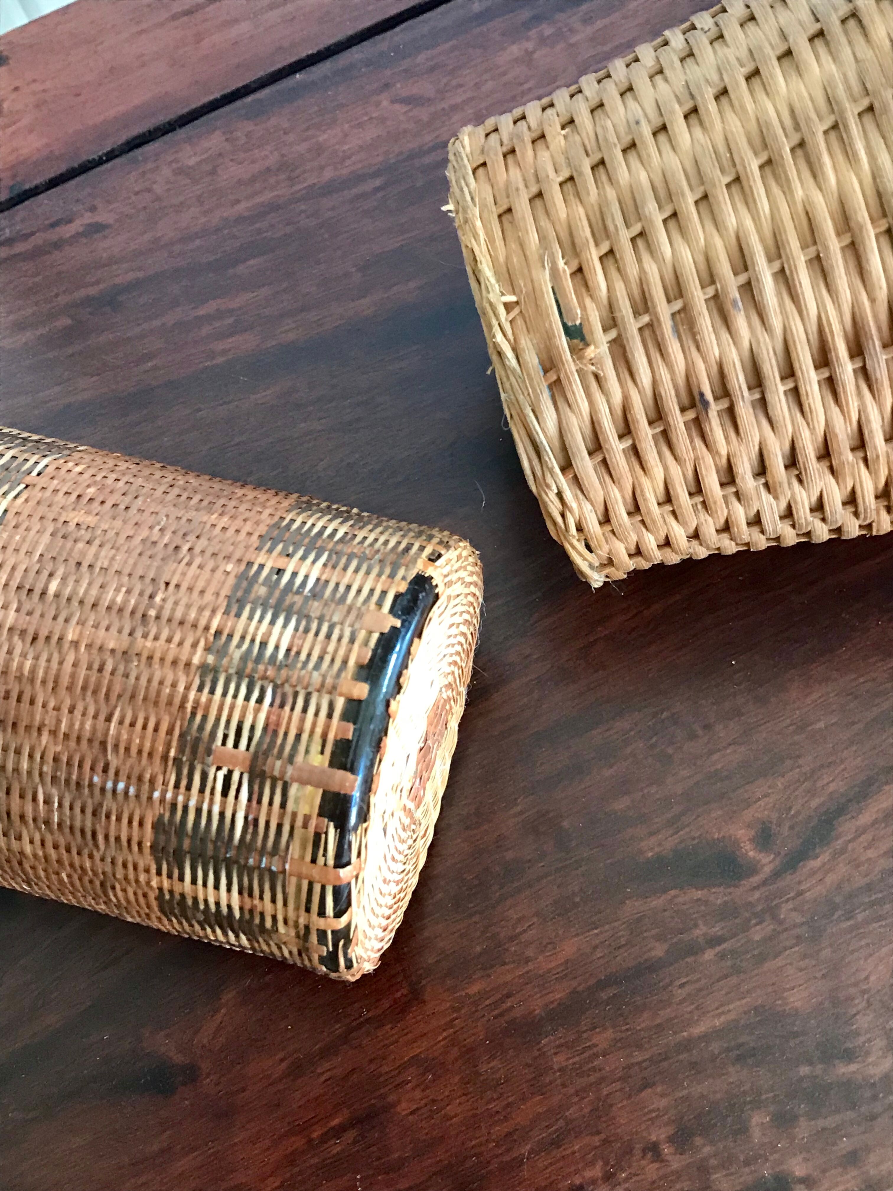 Set of three vintage rattan bottles