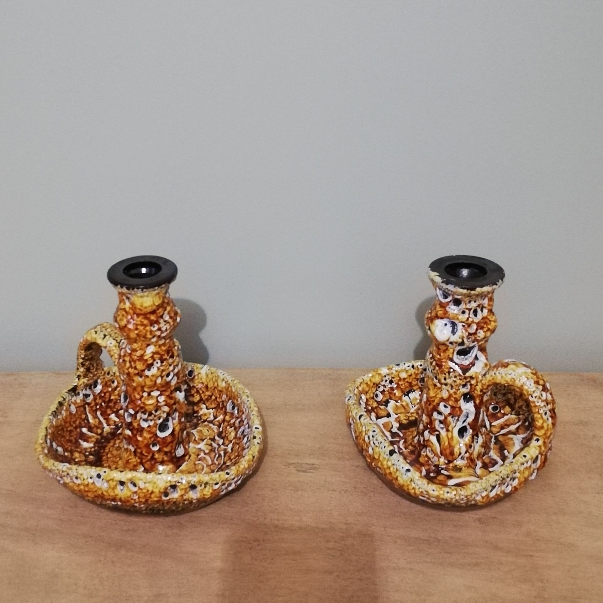 Pair of honey-colored Fat Lava ceramic candle holders