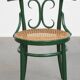 Vintage green bistro chair with woven reed seat
