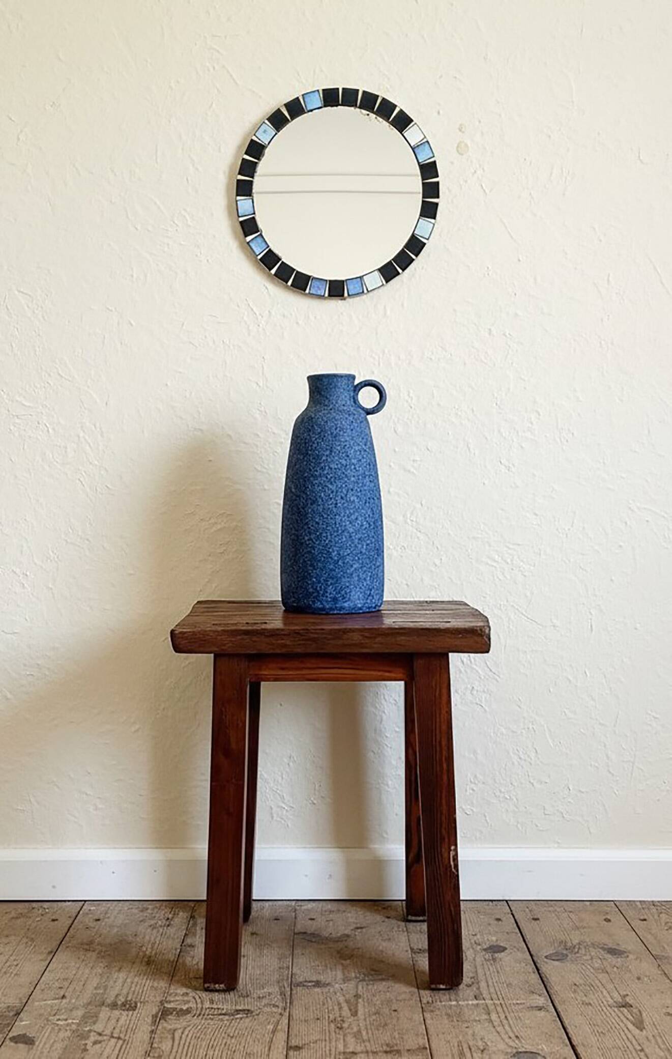 Round mosaic mirror in the style of Vallauris, France circa 1970.