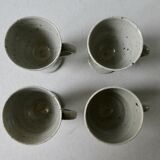 Set of 4 cups, 1 mazagran, 1 milk pot and 1 sugar bowl in pyrity sandstone, signed