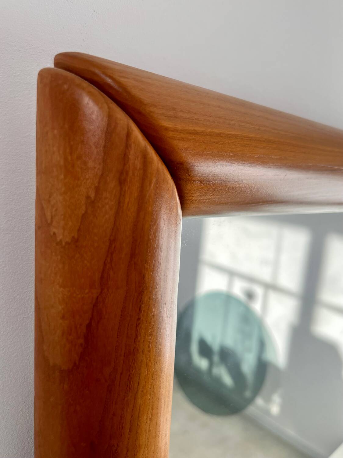 Old mirror in solid elm design from the 70s vintage brutalist style