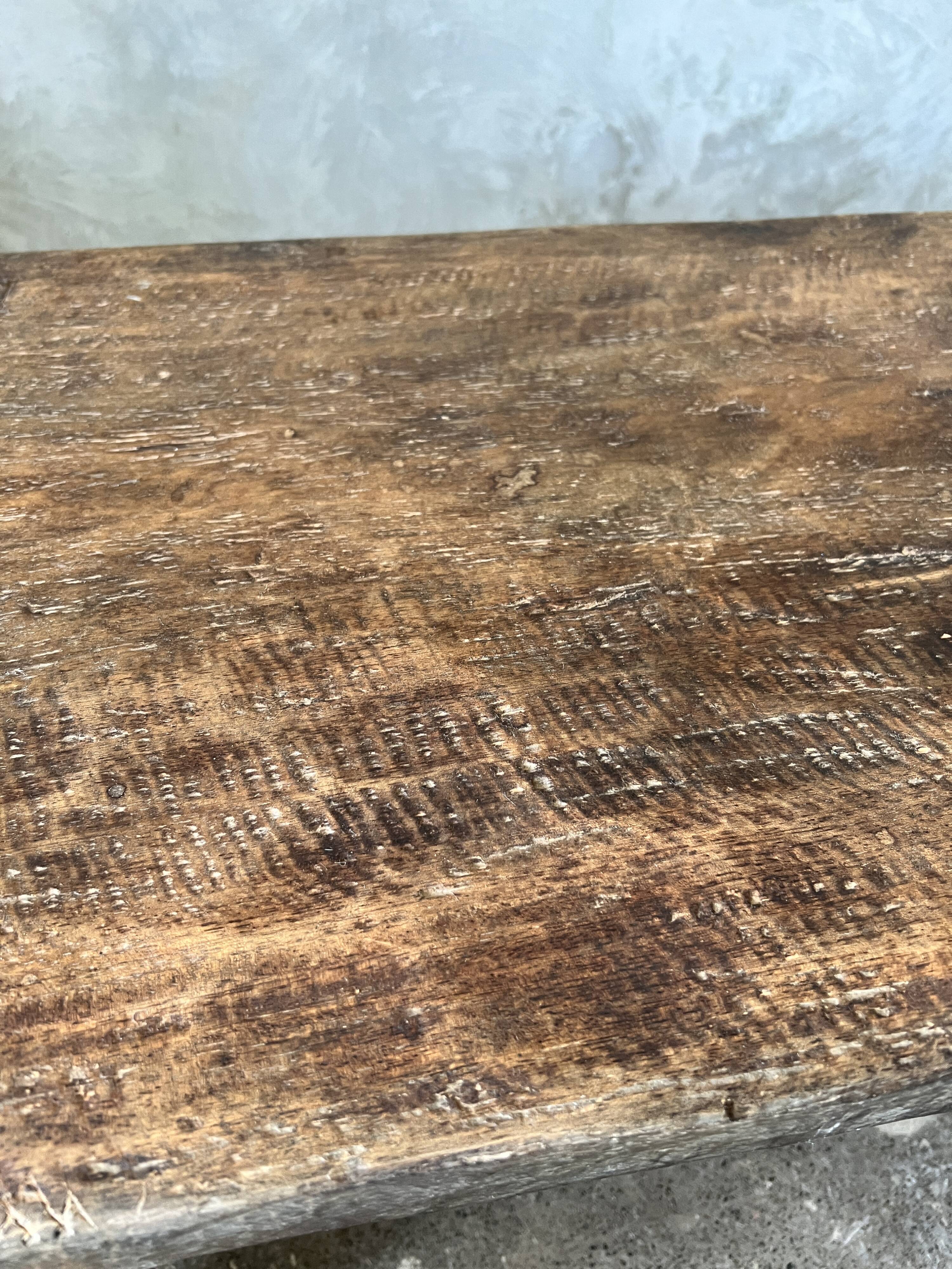 Large rounded coffee table in old Asian teak