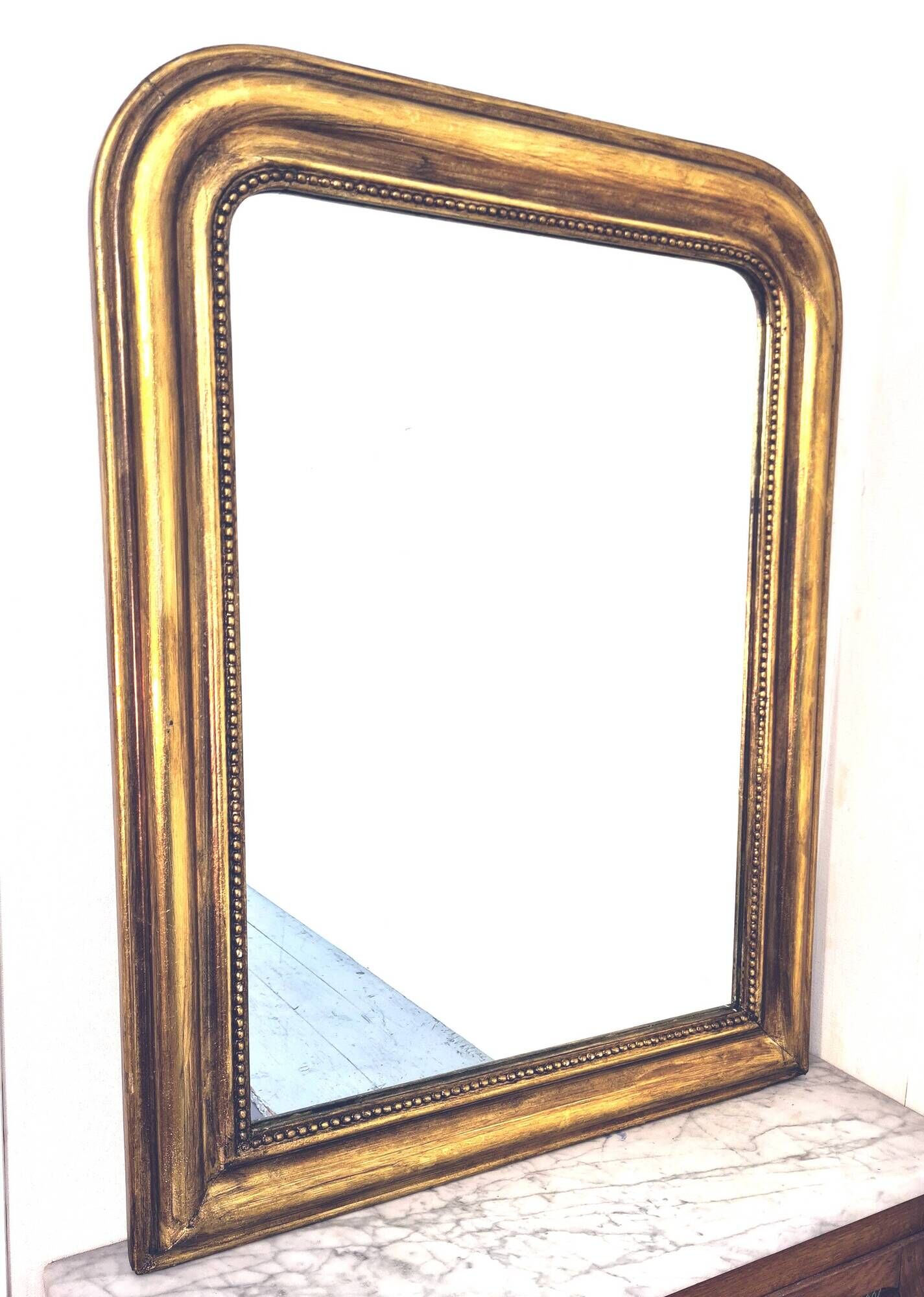 Old large Louis Phillipe mirror, gilded with gold leaf - Emilien"