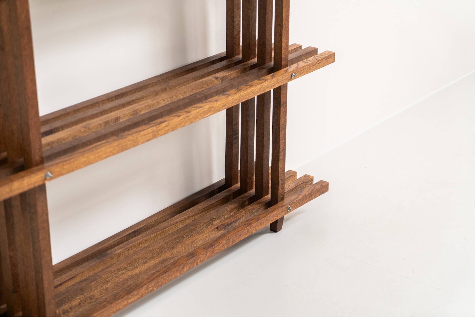 Sculptural wengé slat bookcase (Europe, 1960s).