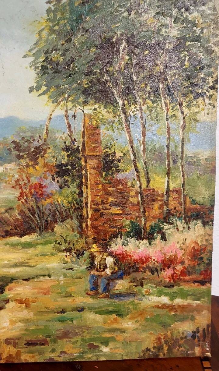Oil painting on panel of a rural landscape, signed.