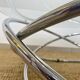 Coffee table with glass top and chrome tubular base