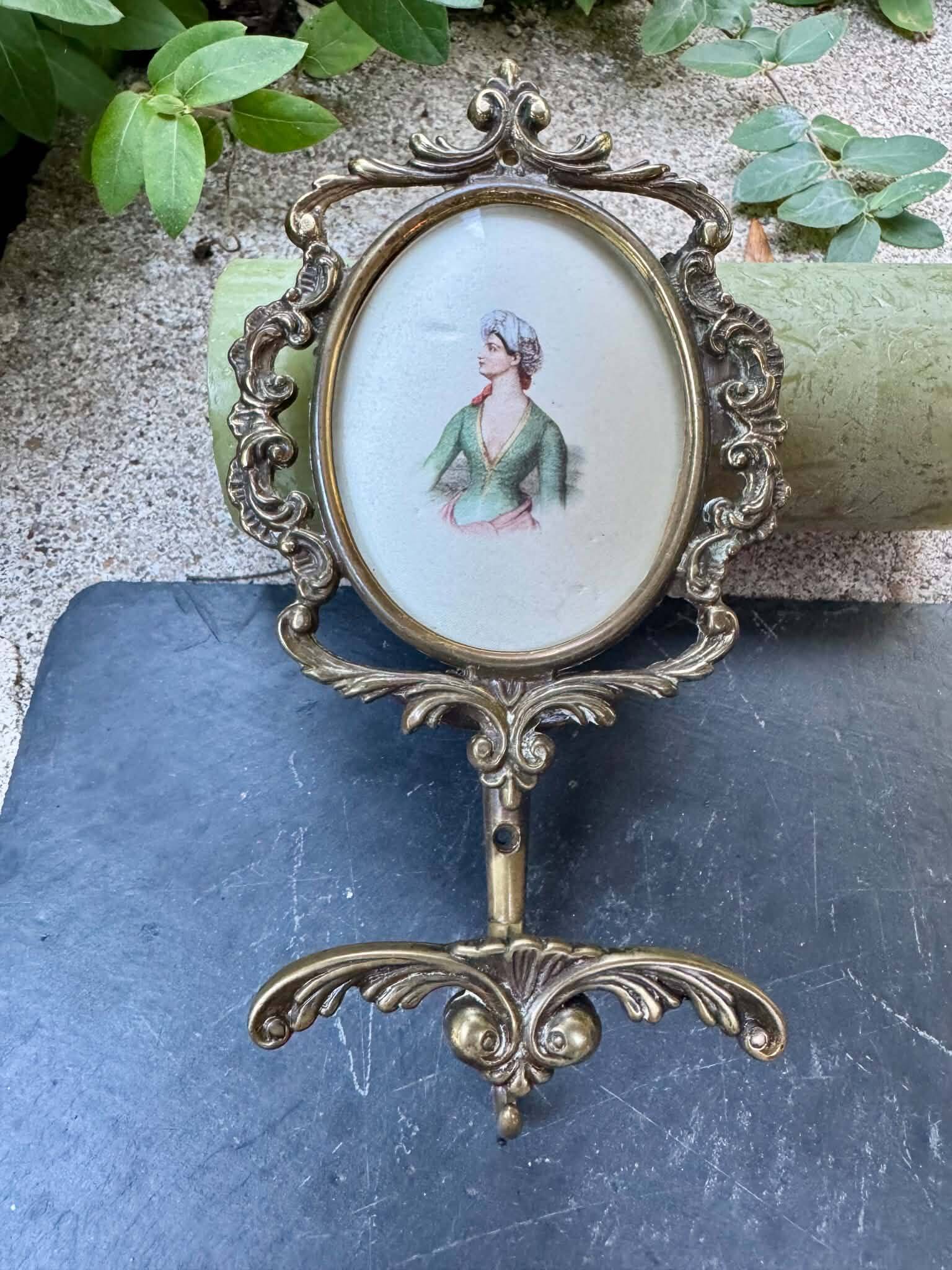 Pair of baroque brass coat hooks