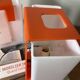 Pair of orange plexiglass wall sconces from the seventies.