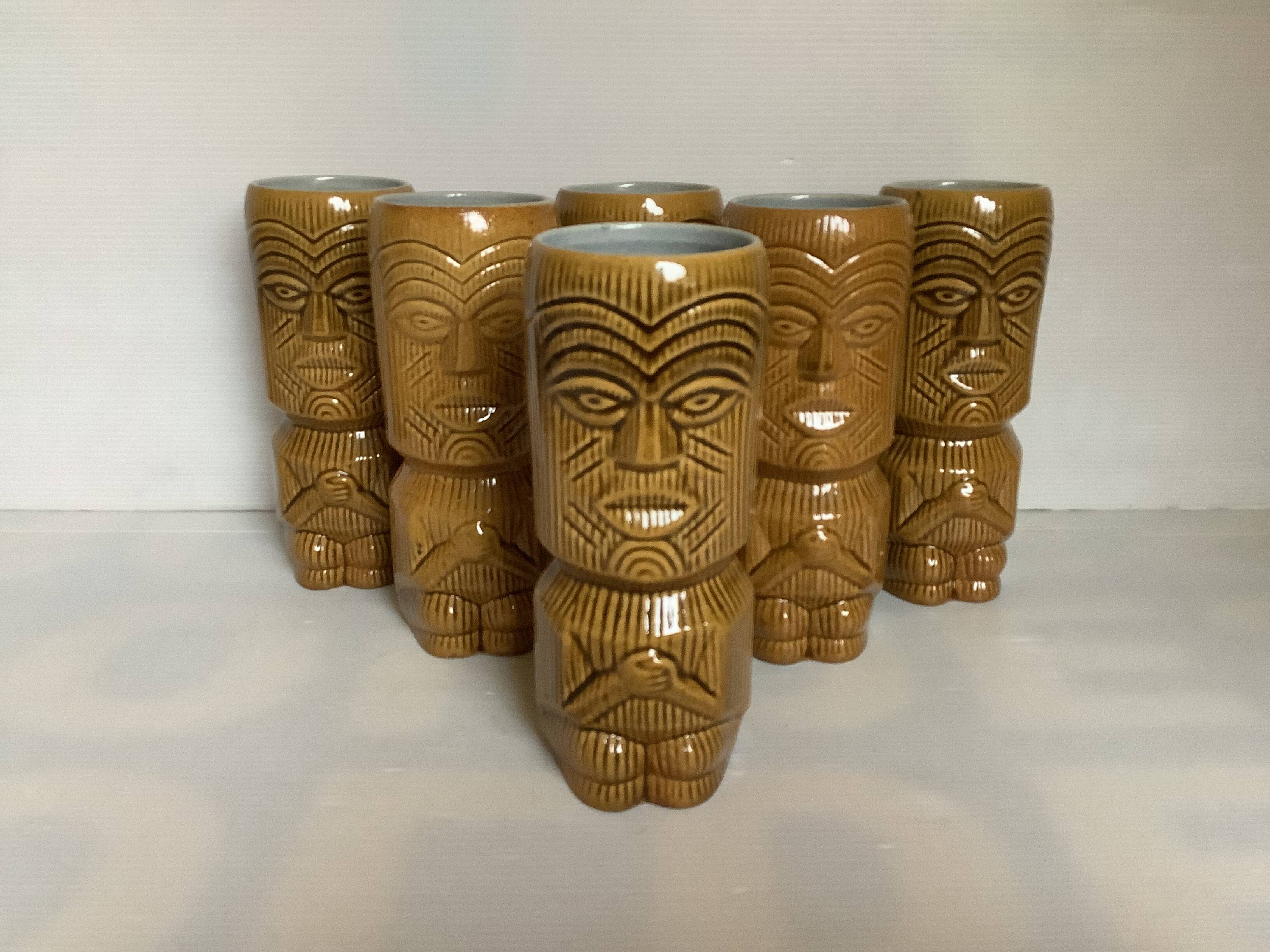 Six moai vases