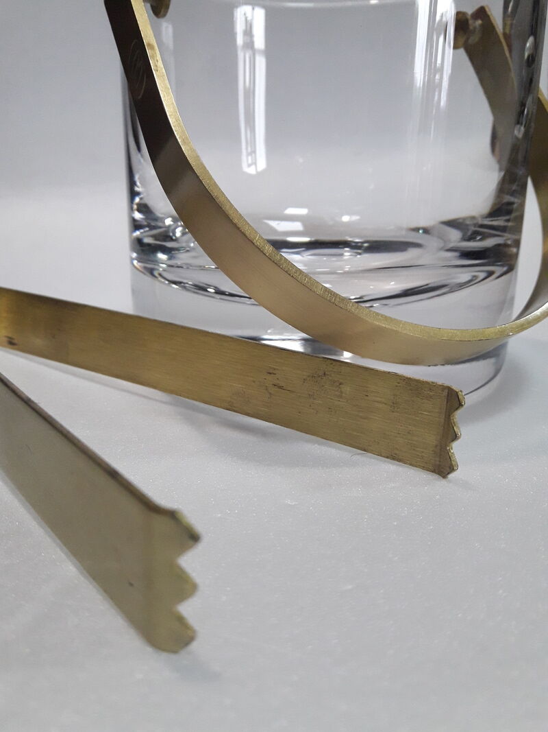 Ice bucket, ice cubes and its vintage pliers