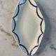 Ravier en terre de fer décor bleues 24cm