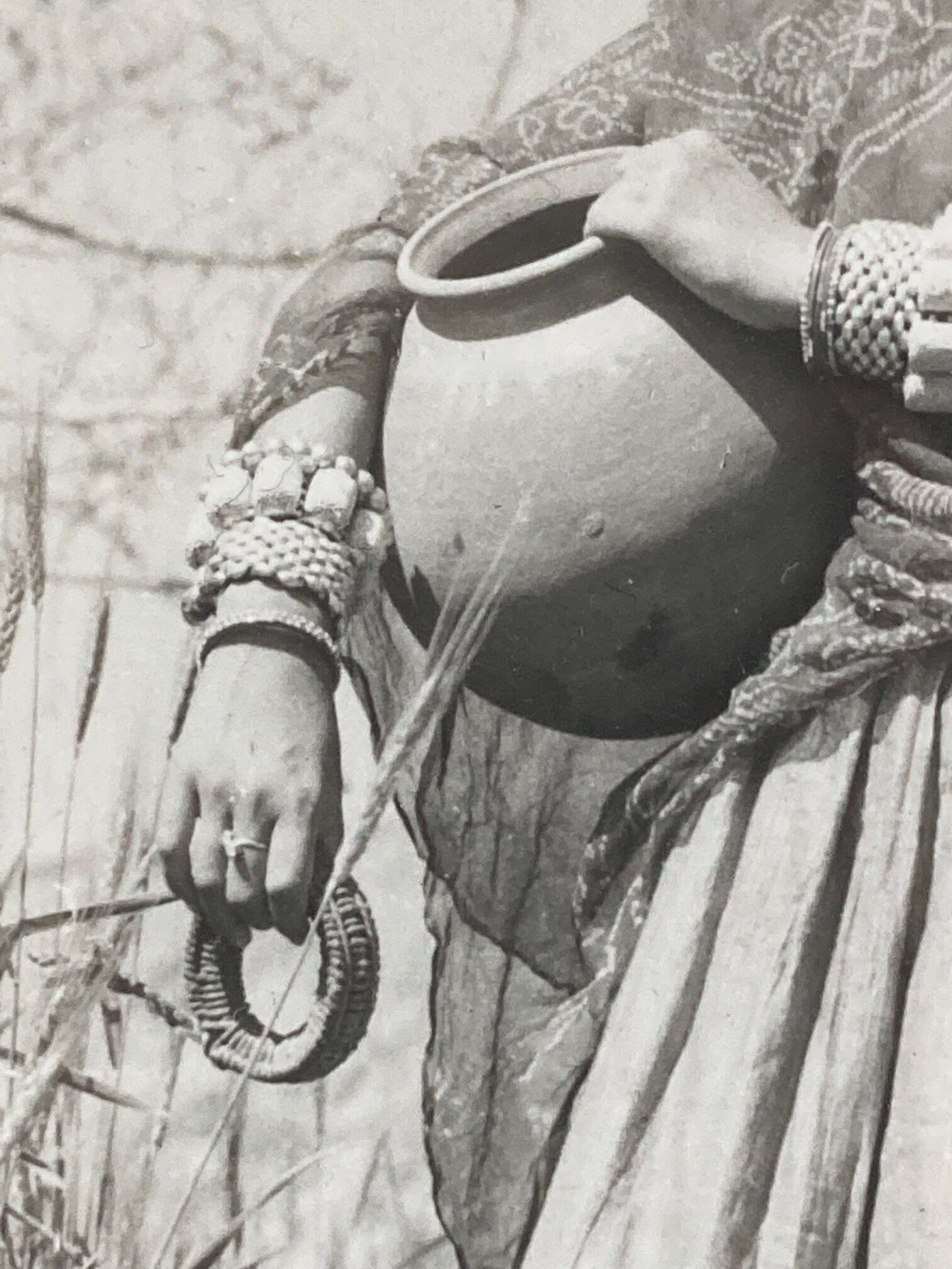 Original photograph by Suraj N. Sharma: young woman and amphora