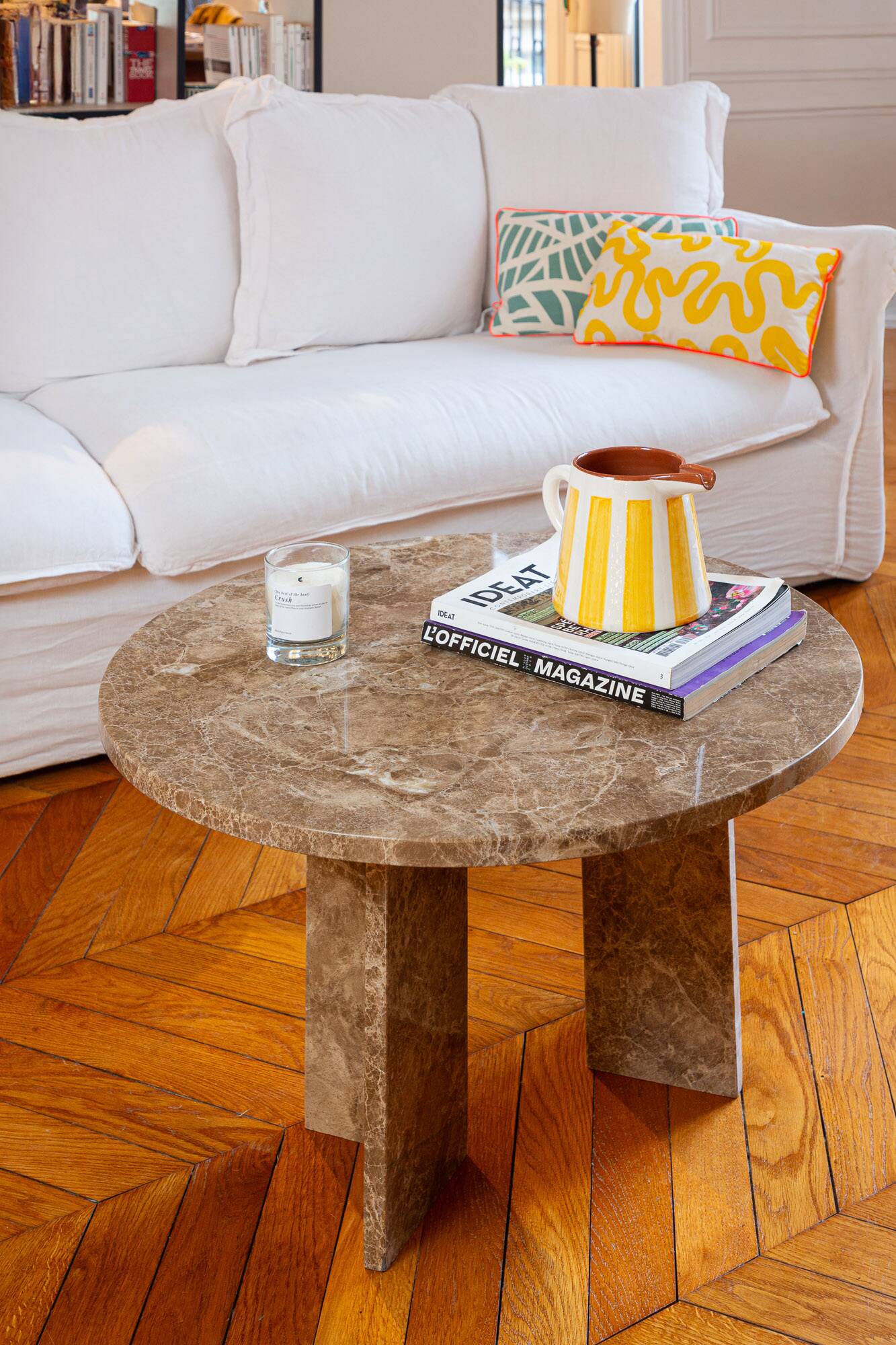 Round table in beige marble