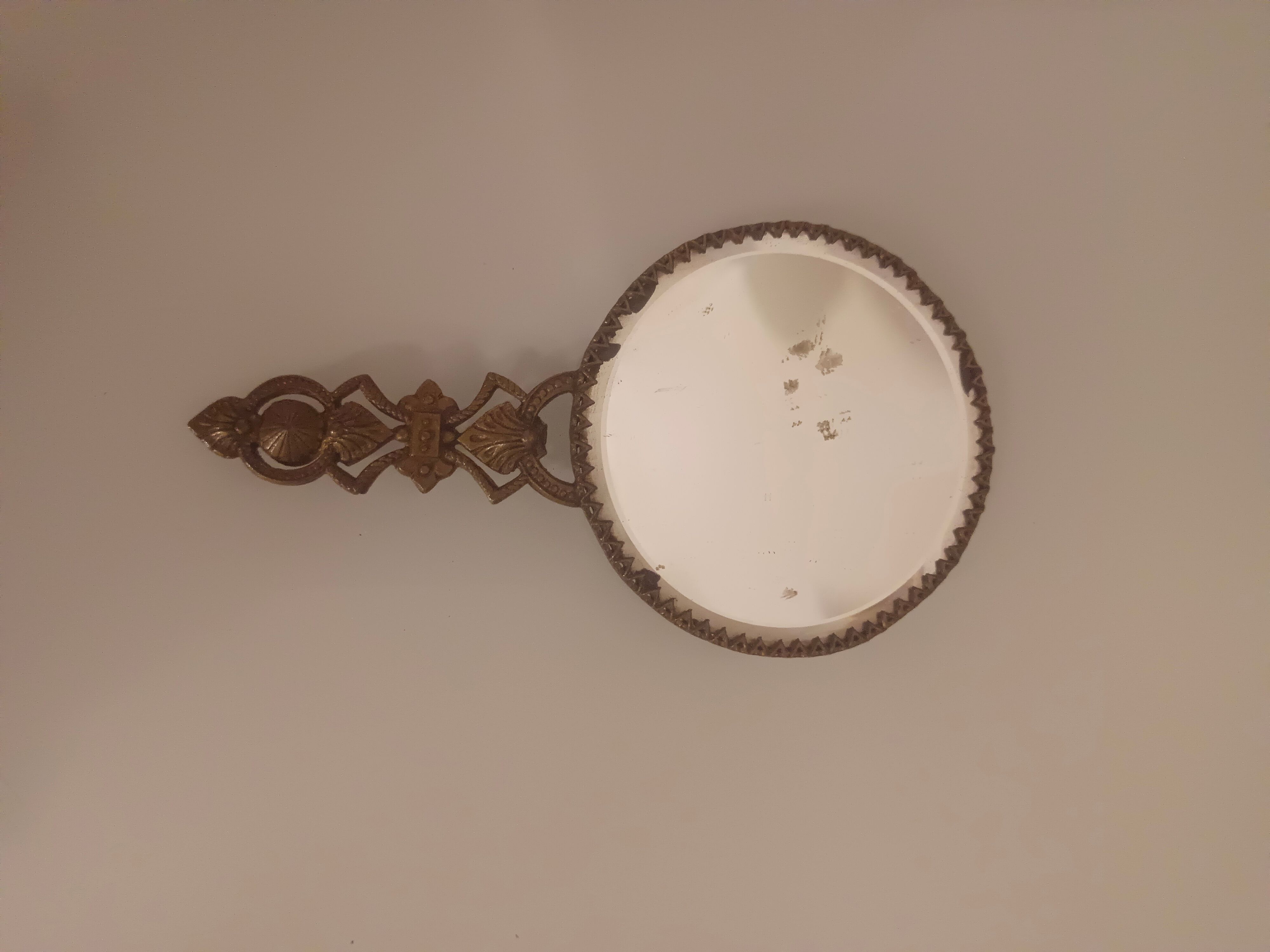 Brass hand mirror, 10 cm