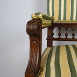 Neo-Renaissance walnut armchair with lion heads, circa 1880