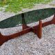 Designer coffee table by Hugues Poignant in rosewood and smoked glass from the 70s