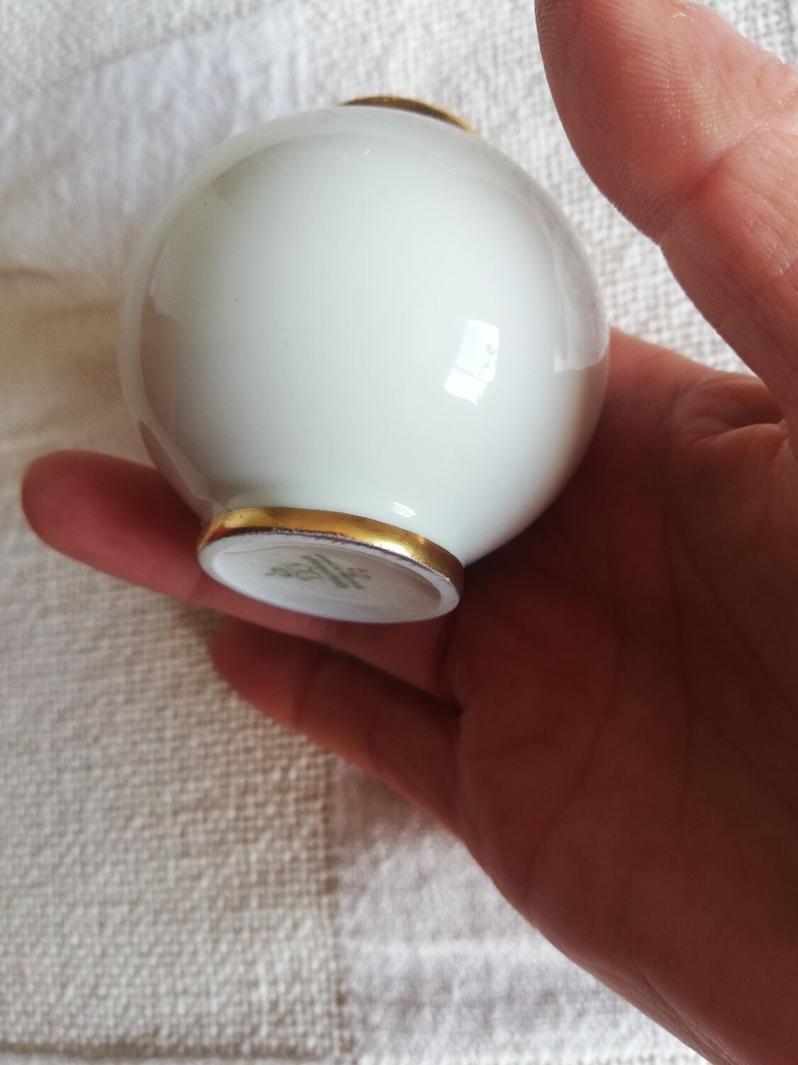 Very small round vase in off-white color with gold edging ESCHENBACH
