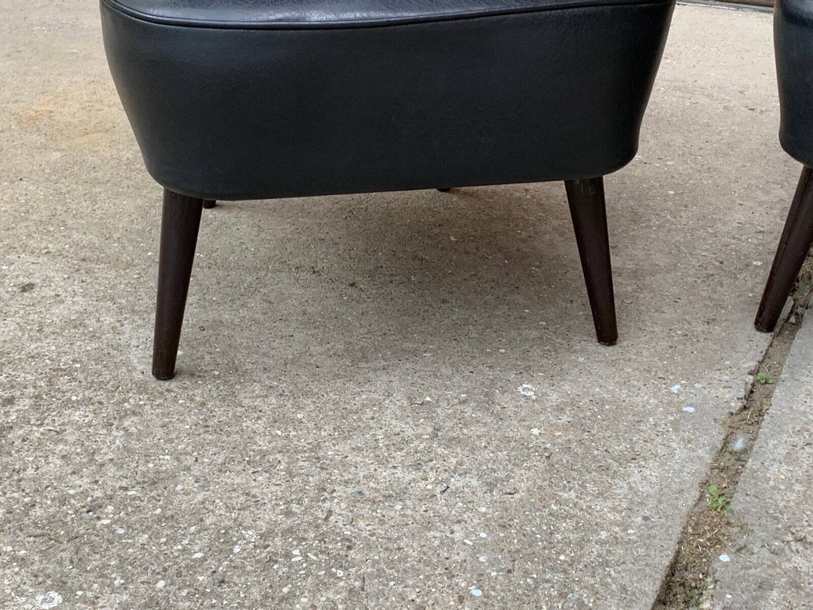 Pair of black cocktail chairs in beech and vinyl, Mid-Century style, 1950s.