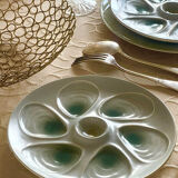 11 oyster plates 1960.