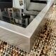 Coffee table – Black glass and brushed metal – 1970s