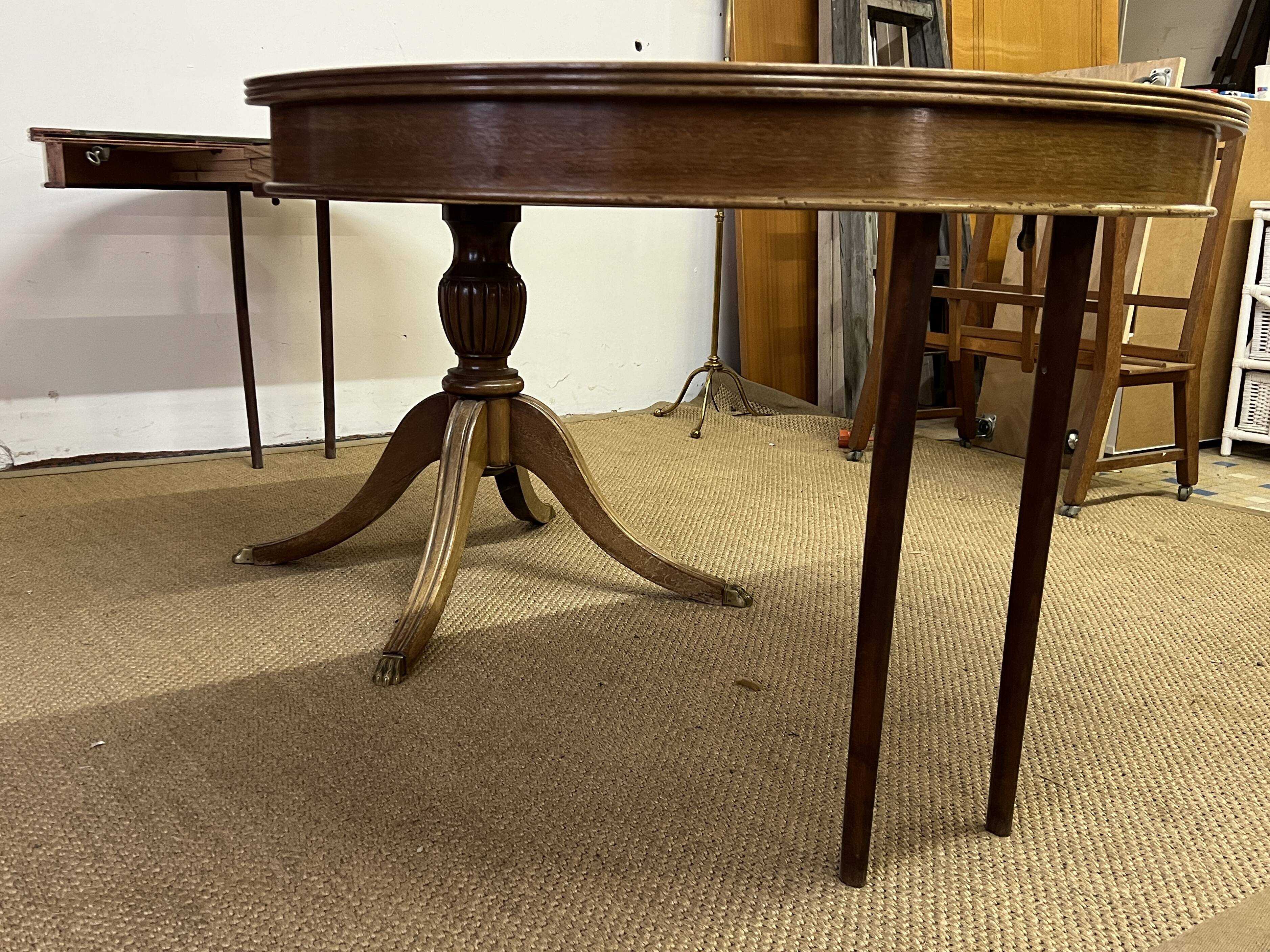 Empire style round table "Lion's Paws"