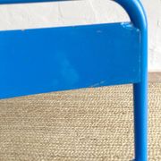 Pair of Mullca nursery chairs in metal and wood painted red and blue