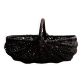 Dark wicker basket, mushroom basket.