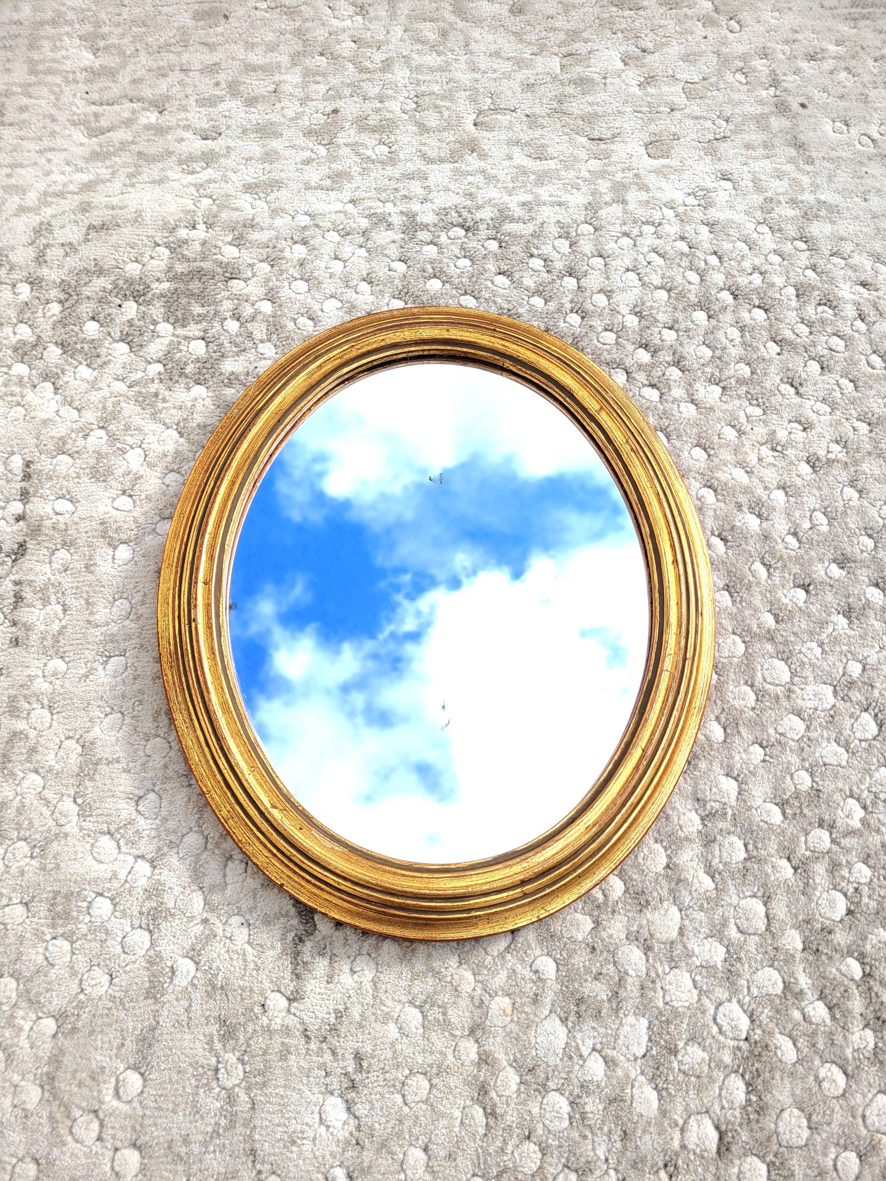 Old oval golden mirror 30x35cm