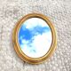Ancien miroir doré ovale 30x35cm