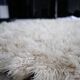 Vintage ecru natural wool round rug