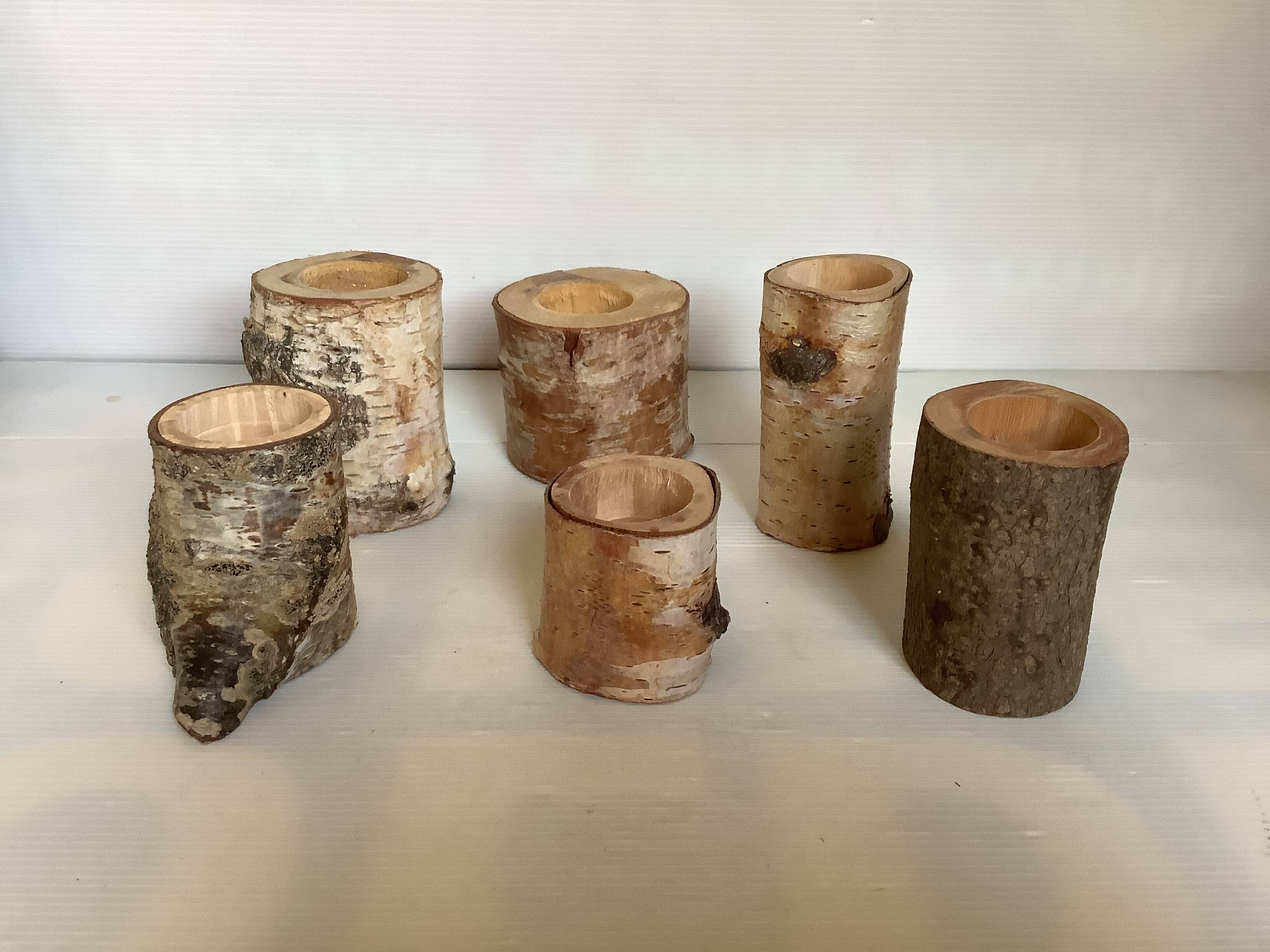 Six wooden candlesticks