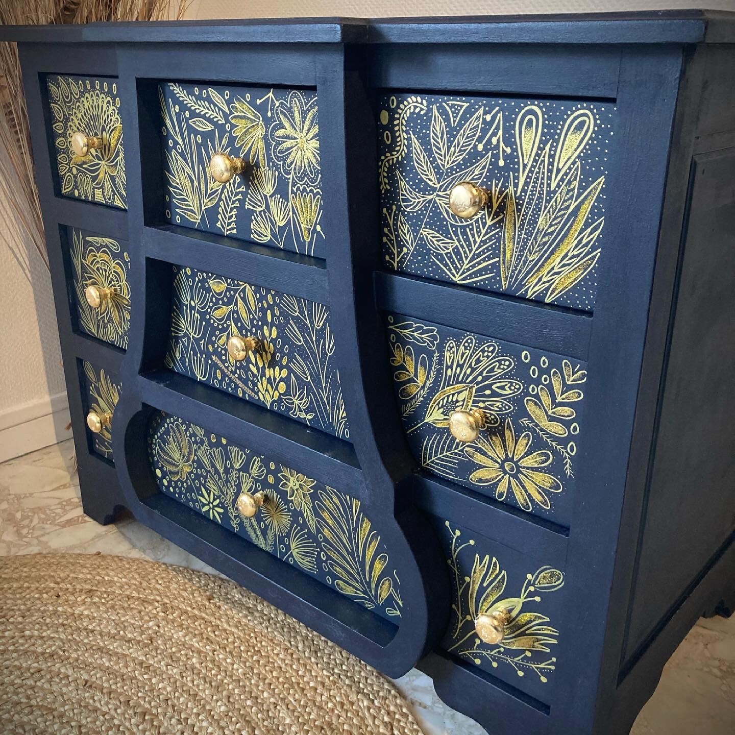 Atypical blue chest of drawers, hand-painted golden patterns