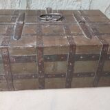 Old tribal chest in hammered metal