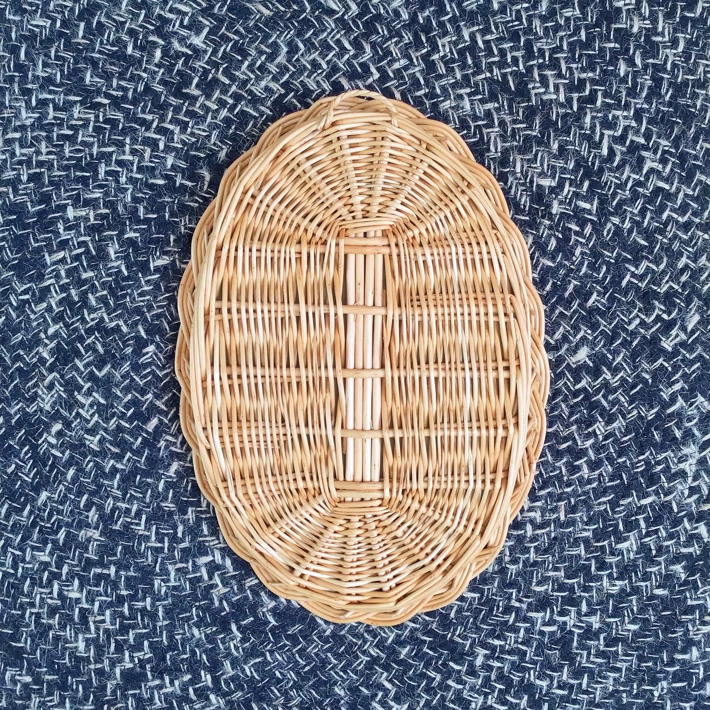 Vintage oval rattan mirror