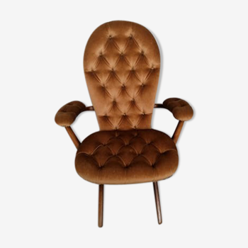 Vintage padded velvet armchair