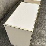 Cabinet and chest of drawers in ivory lacquer, inspired by Mahey and Vandel.