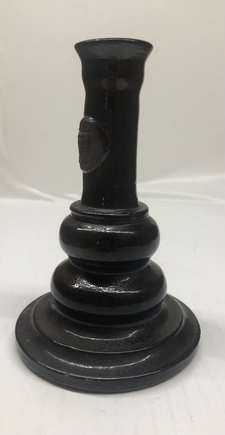Black ceramic candlestick and escutcheon
