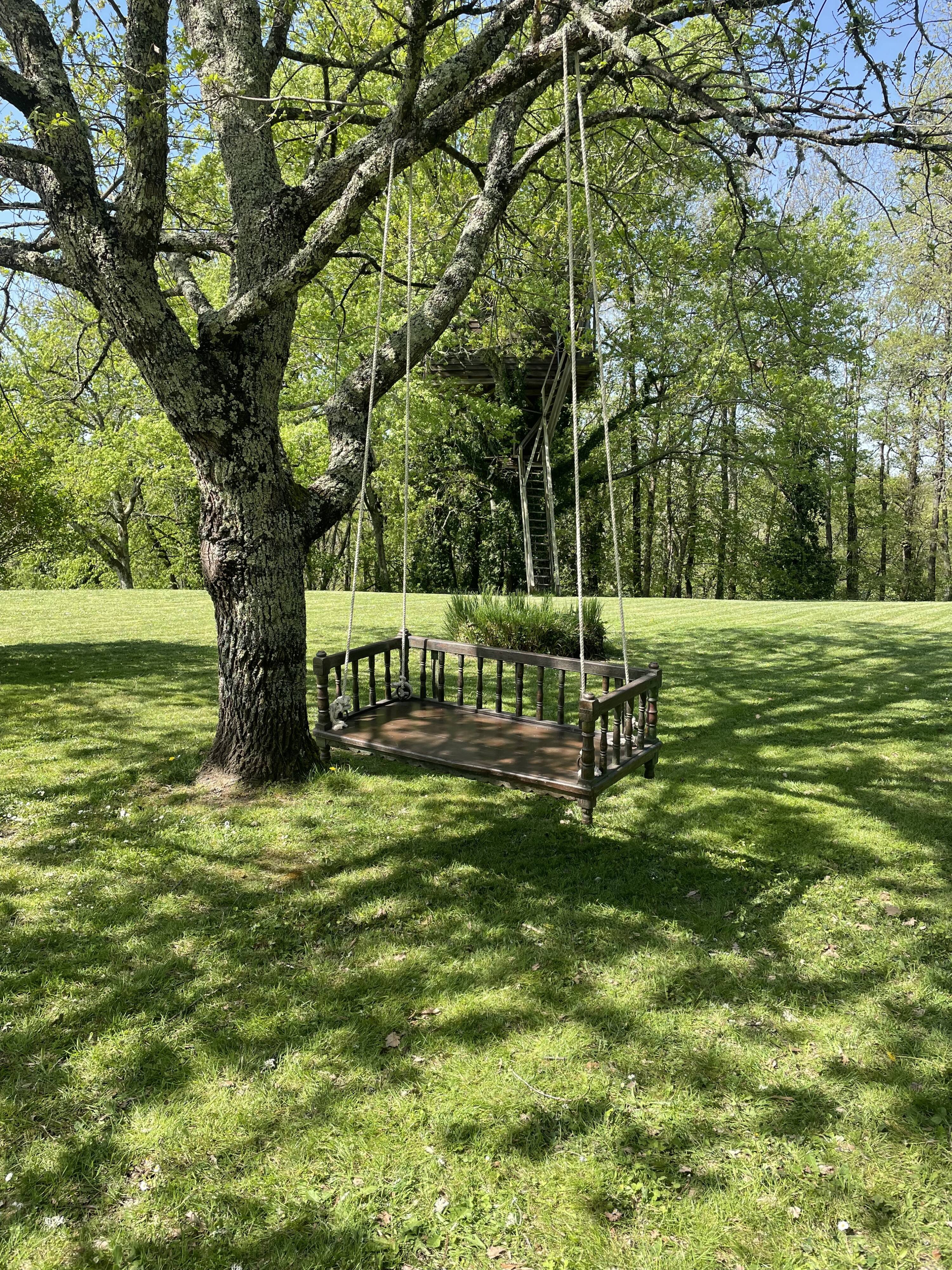 Black lacquered teak rocking chair