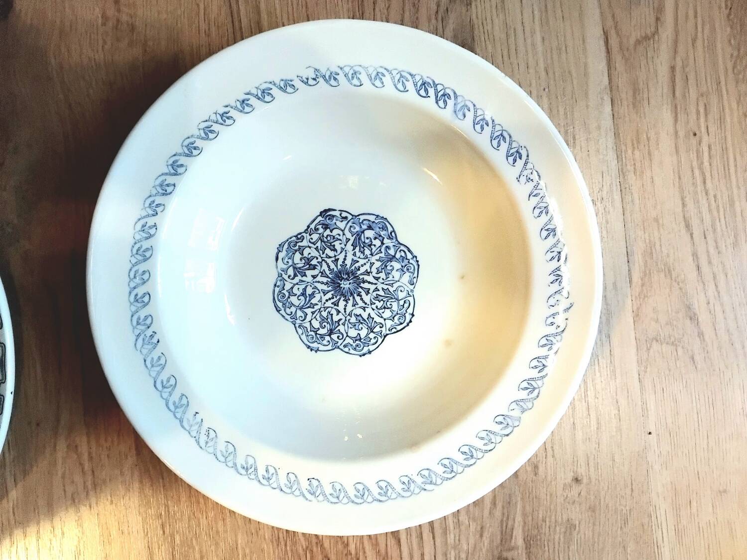 Set of 4 mismatched blue Terre de Fer soup plates