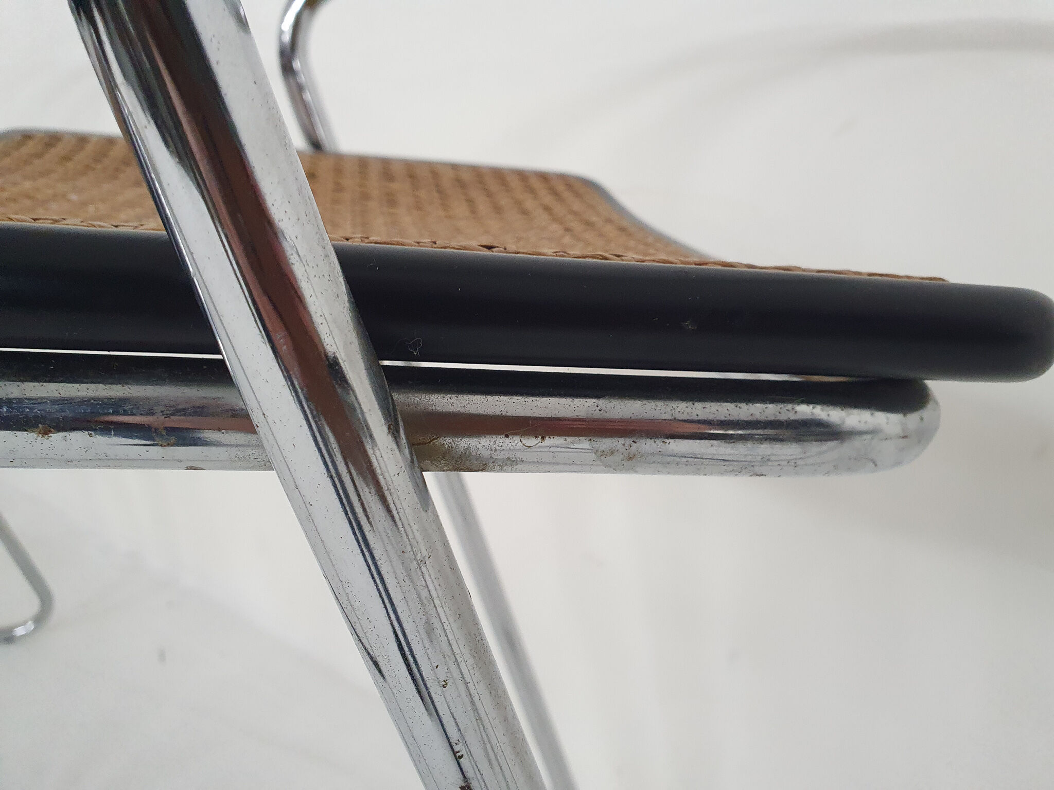 Set of four chrome and cane bar stools, 1970's