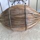 Asian artisanal basket in the shape of a boat