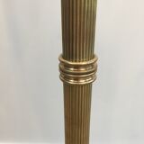 Floor lamp of parquet in neoclassical style in brass with dolphin heads