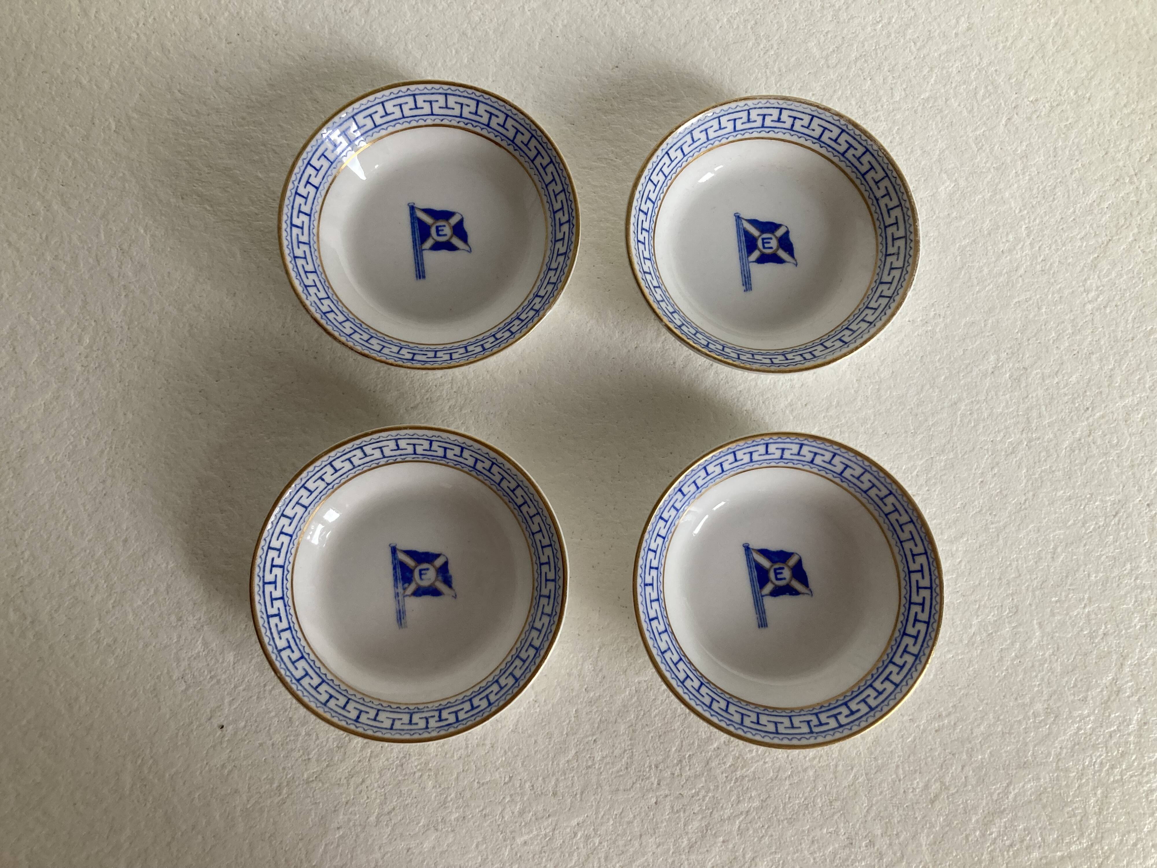 4 coffee cups and saucers