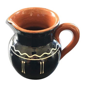 Midnight blue pitcher with ivory decor