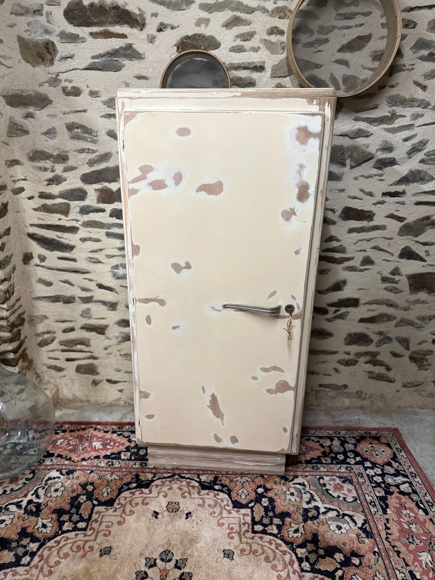 Small one-door Art Deco cabinet with a patina.